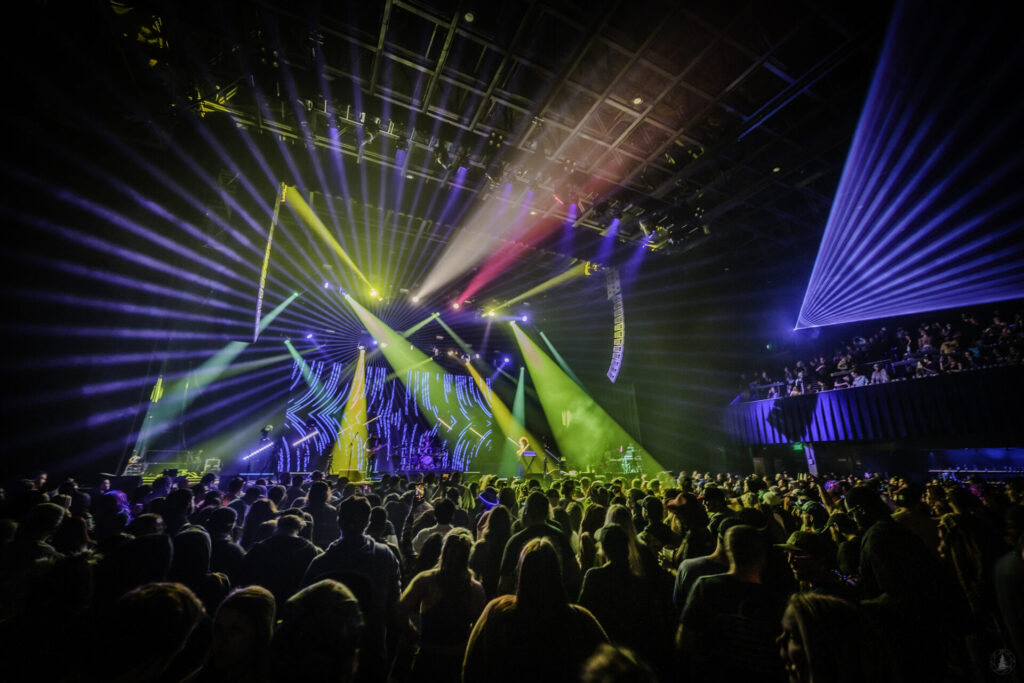 photo of sunsquabi concert with lazers overlooking crowd at a music festival photographed by @SilkyShots