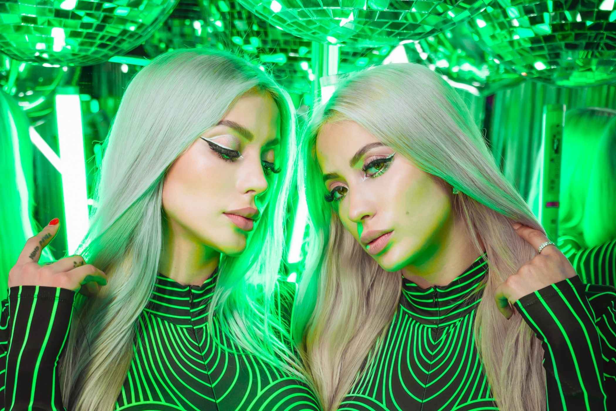 Le Twins inject techno energy into their latest release “Need U To Go (Red Light, Green Light)”